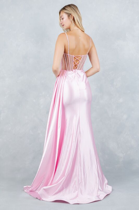 Front view of blush pink floral corset prom dress with high slit